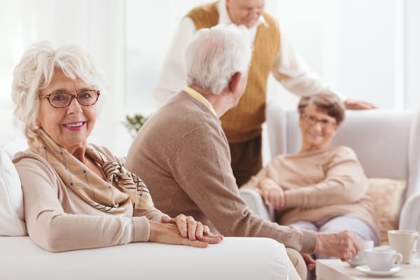 Residents socializing in a bright common area