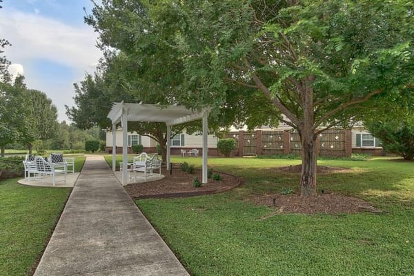 Relaxing outdoor space with seating and shaded area