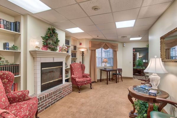 Comfortable common area with seating and fireplace