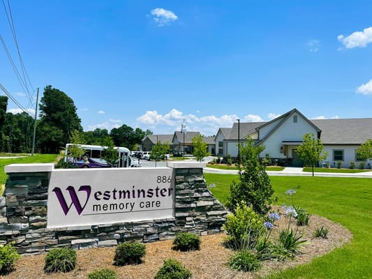 Exterior view of Westminster Memory Care building and signage
