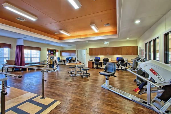 Interior of a bright activity space with exercise equipment