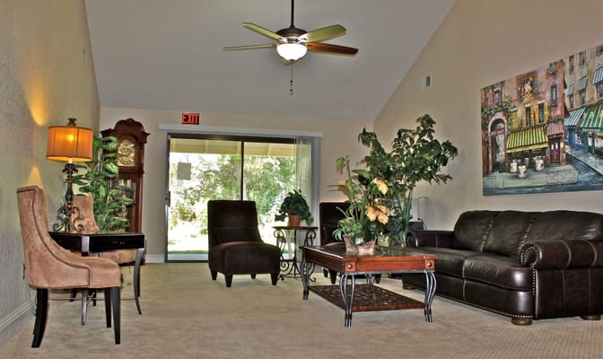A cozy common area with seating and decor