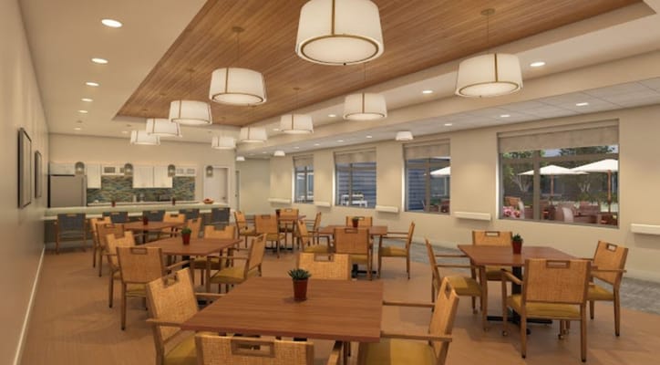 Bright dining area with tables and chairs