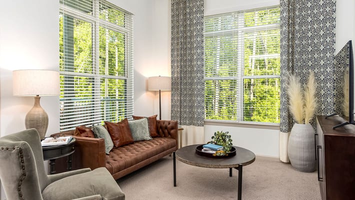 Cozy common area with a couch and natural light