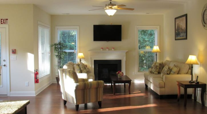 Common area with comfortable seating and warm lighting