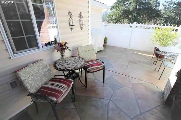 Outdoor seating area with table and chairs