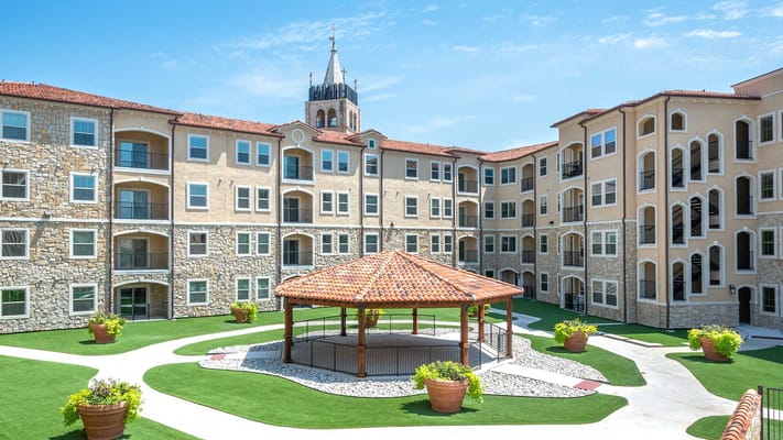 Outdoor courtyard with gazebo and landscaping