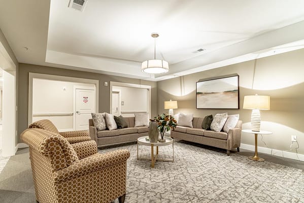 Cozy common room with comfortable seating and warm lighting