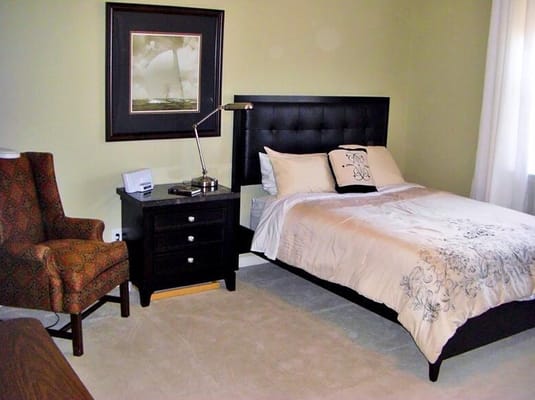 Cozy private room with bed and seating area