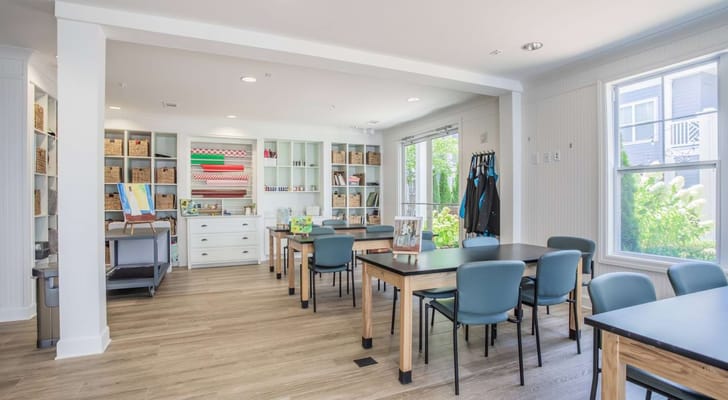 Bright common area with tables and chairs
