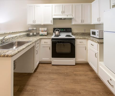 Well-equipped kitchen in a senior living facility