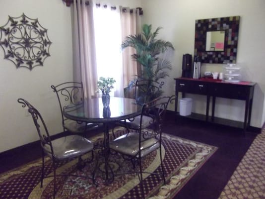 Cozy dining area with a round table and chairs