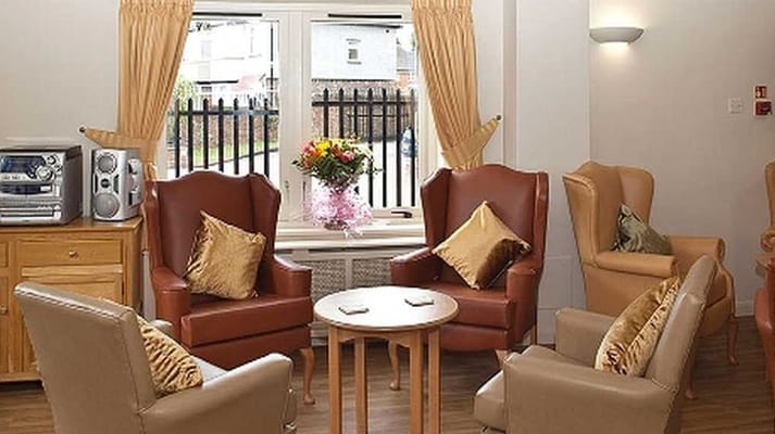 Comfortable seating area with armchairs and a flower arrangement