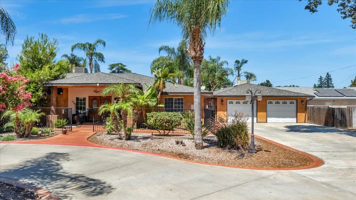 Exterior view of the assisted living facility with landscaping