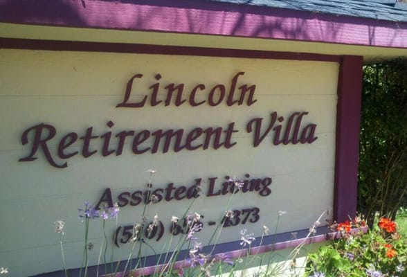 Signage for Lincoln Retirement Villa with flowers