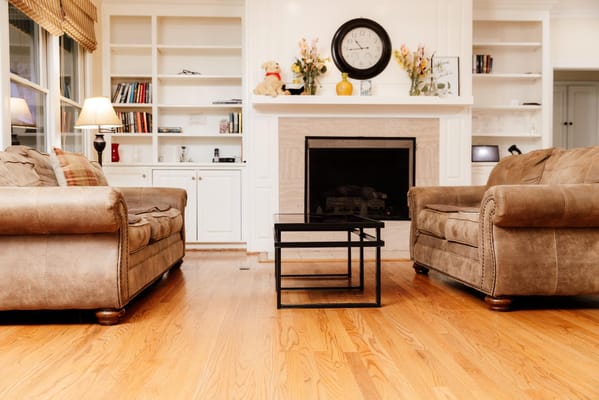 Cozy common area with couches and a fireplace