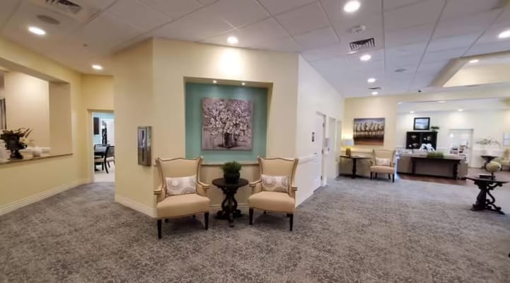 Bright common area with seating and decor