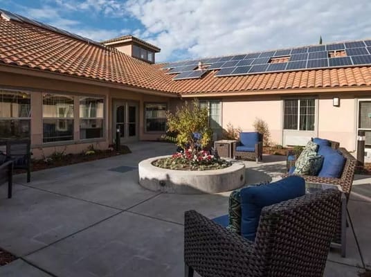 Outdoor courtyard with seating and landscaping