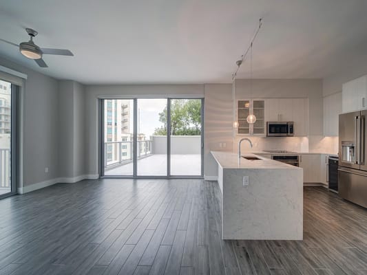 Modern interior of a spacious living area with balcony