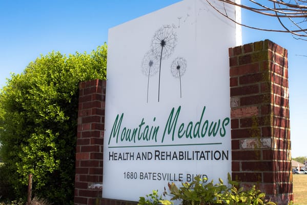 Sign for Mountain Meadows Nursing & Rehab Center