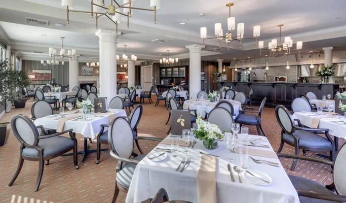 Upscale dining room with elegant table settings