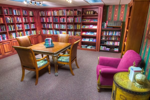 Bright interior of a cozy library with bookshelves