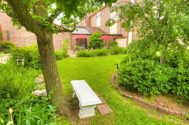 Beautiful garden area with seating and pathway