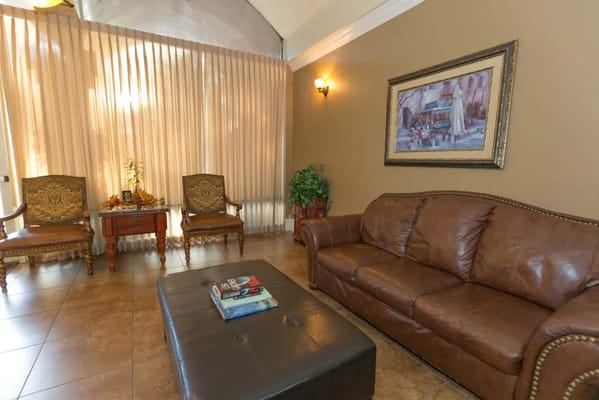 Cozy common area with seating and artwork