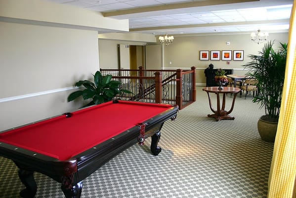 Interior view of a common area with a pool table