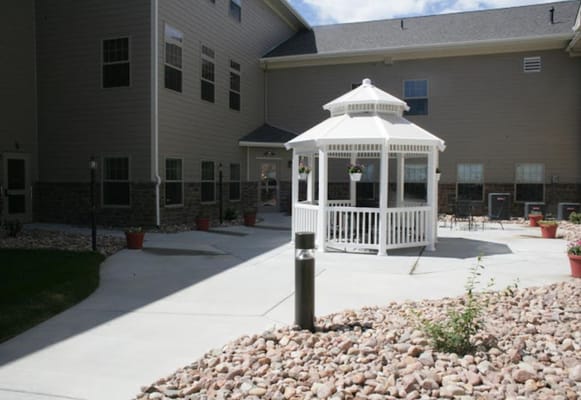 Gazebo in a landscaped outdoor courtyard