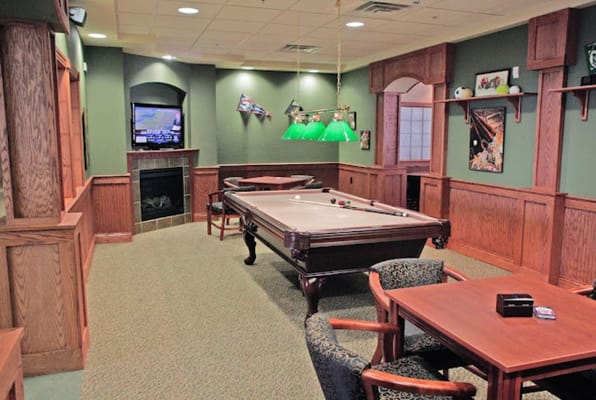 Interior of a game room with a pool table
