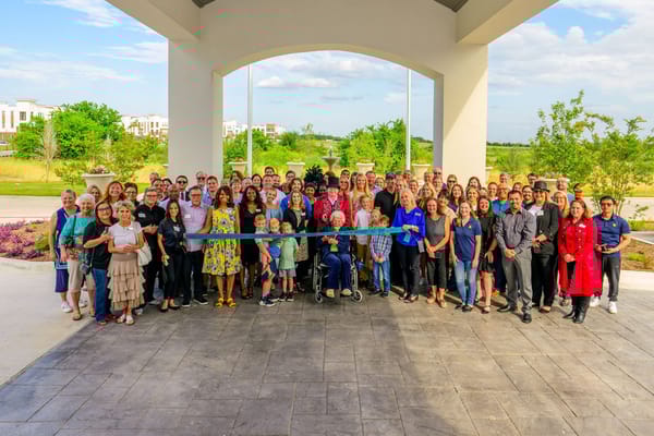 Grand opening ceremony with staff and community members