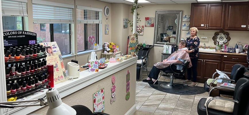 Residents getting manicures in the beauty salon
