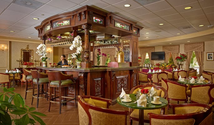Elegant bar area with residents enjoying a drink