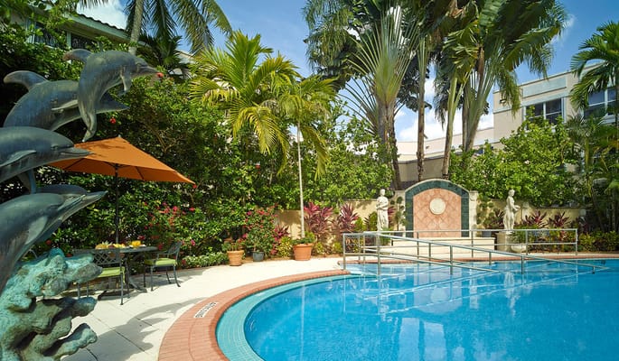 Private pool area surrounded by lush greenery