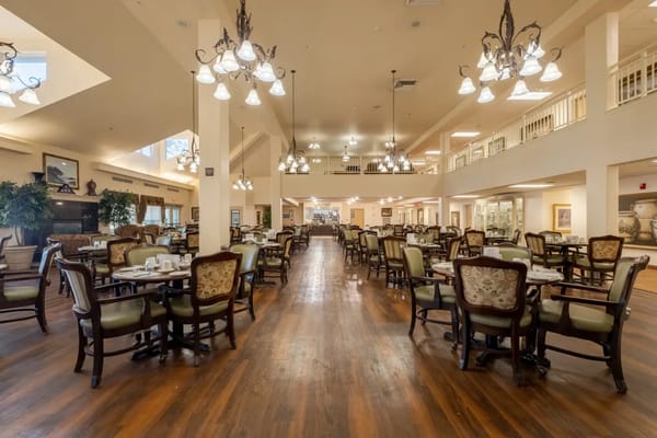 Spacious dining room with tables and chairs