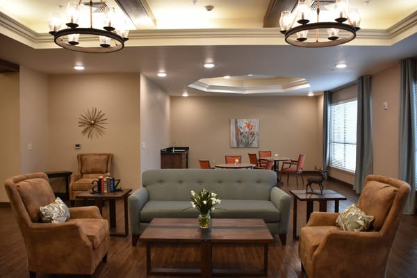 Comfortable lounge space with seating and table.