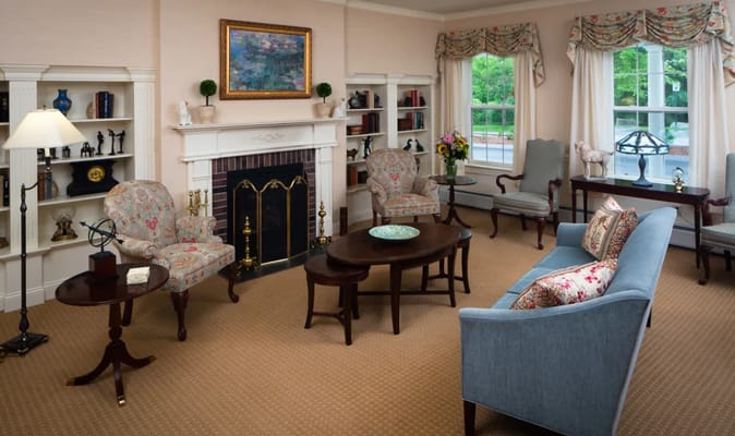 Charming common area with comfortable seating in a warm setting