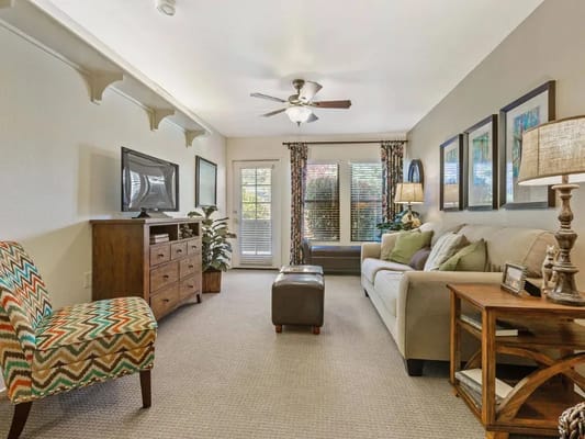 Bright living room with seating and natural light