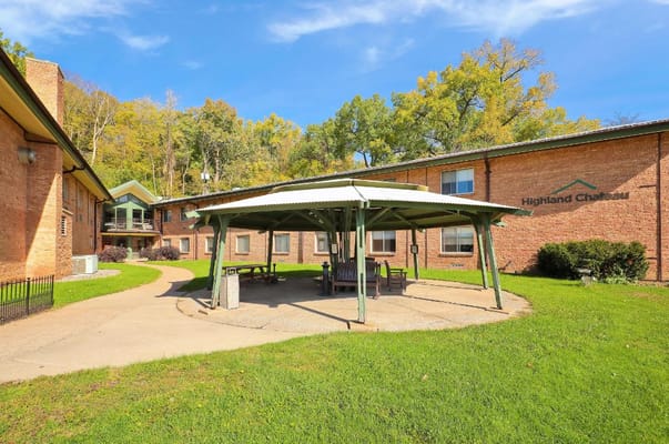 Outdoor gazebo area surrounded by the building
