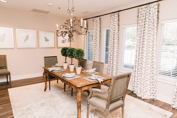 Elegant dining area with a wooden table and decor