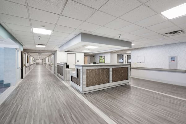 Modern reception area with a long corridor