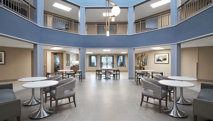 Interior view of the common area with seating and tables