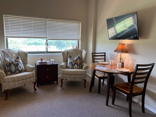 Comfortable sitting area with chairs and a table