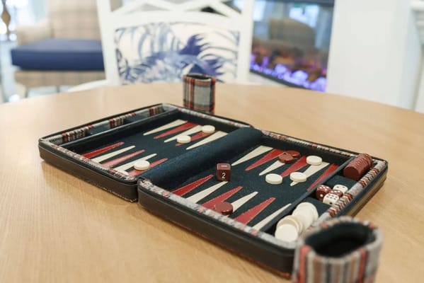 A backgammon game set up on a table