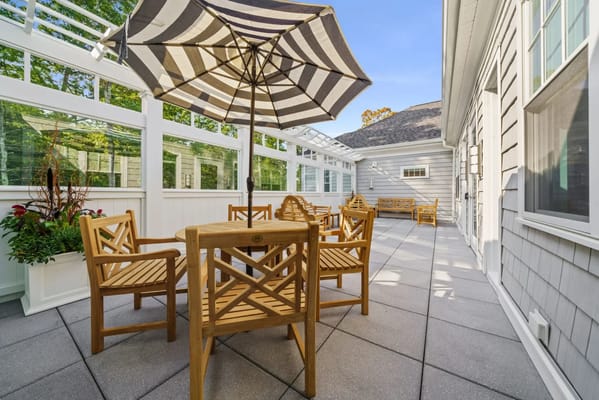 Outdoor patio area with shaded seating