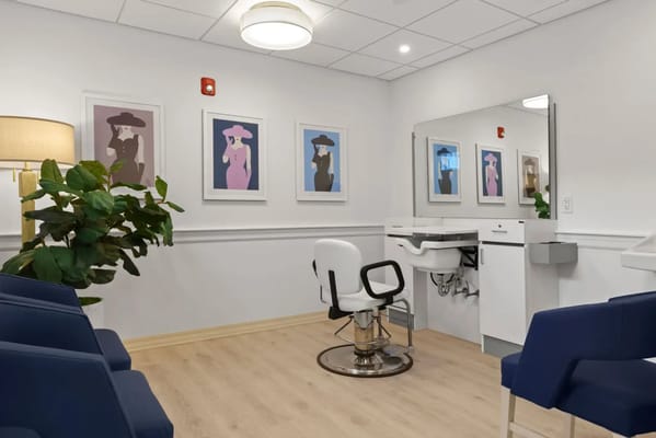 Stylish interior of a hair salon area with artwork