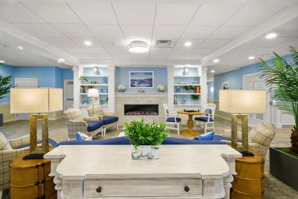 Bright common area with comfortable seating and decor