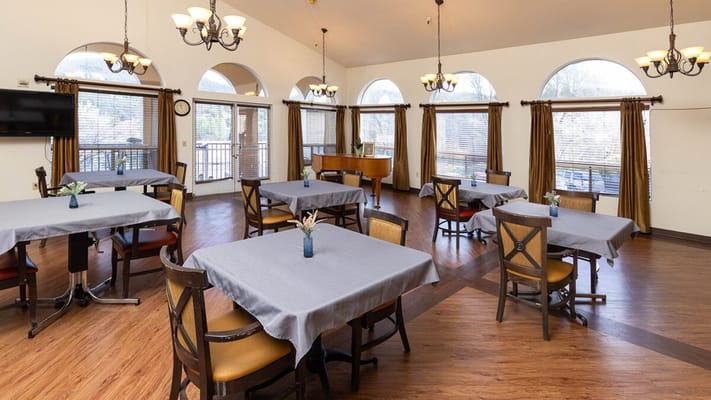 Bright dining room with tables and chairs