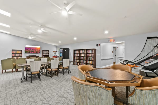 Common area with seating and bookshelves